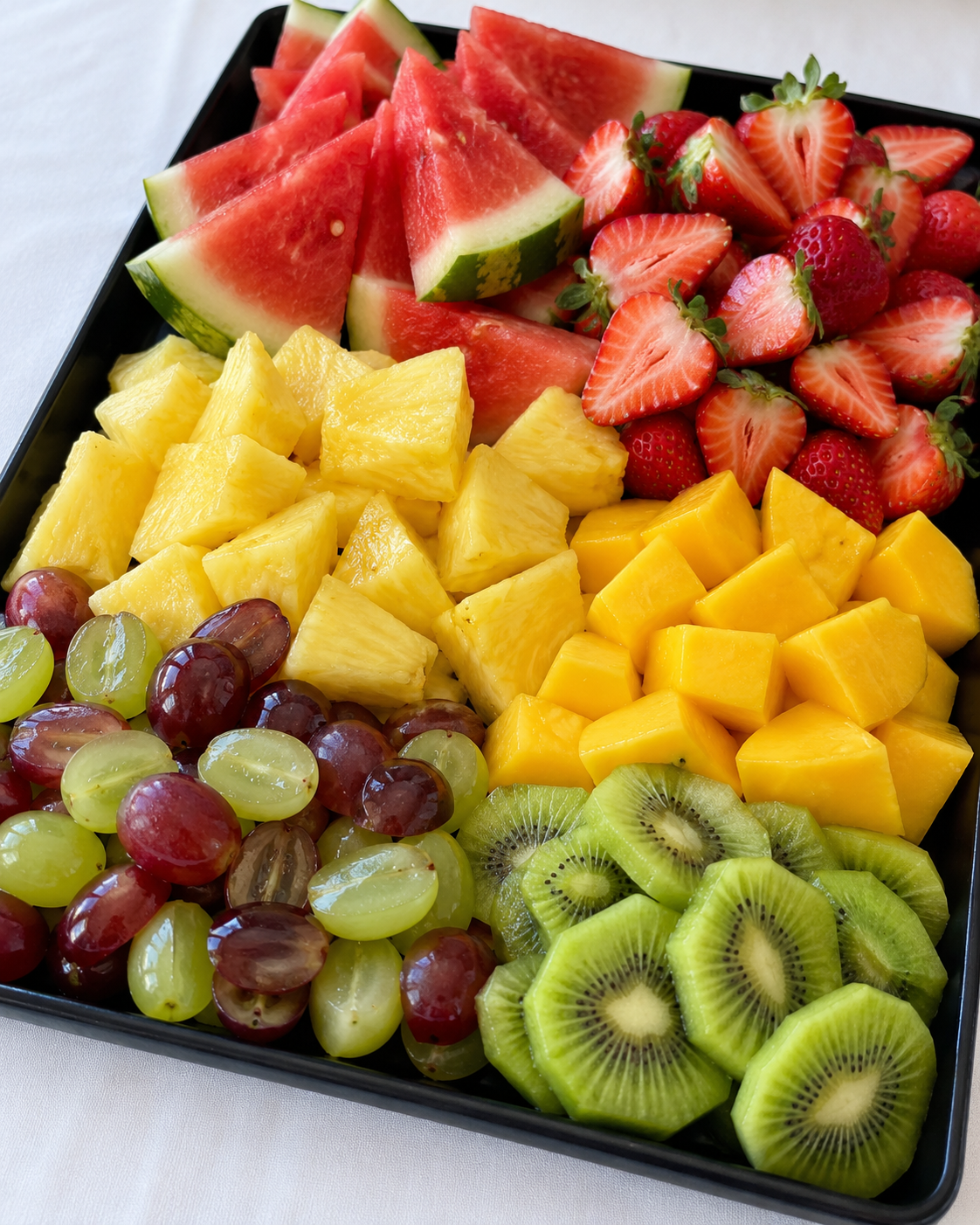 Seasonal fresh fruit platter ready to share